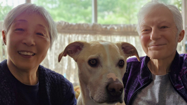 A couple with their dog